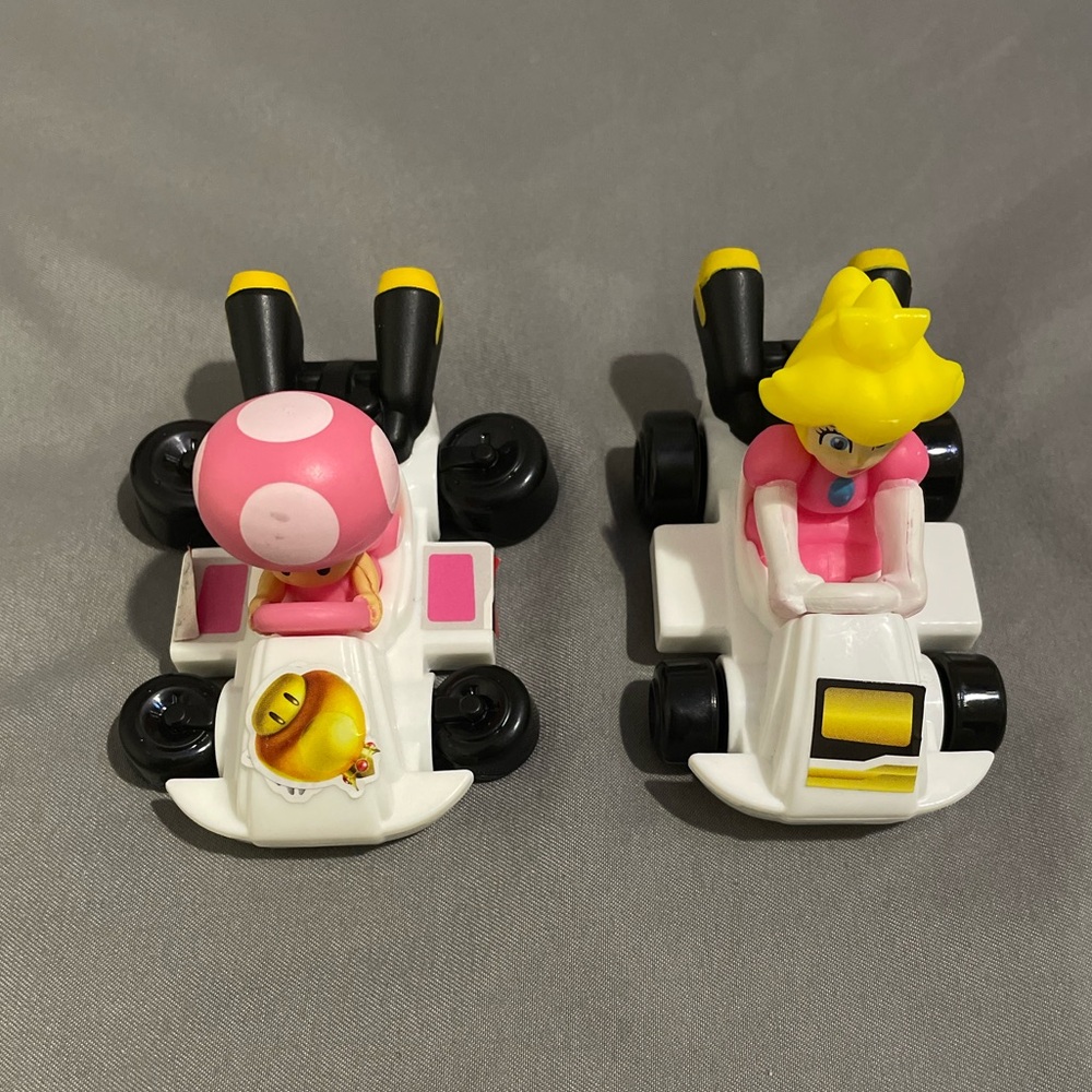 2 Mc Donald’s Mario Kart toys. (Peach & Toadetta)